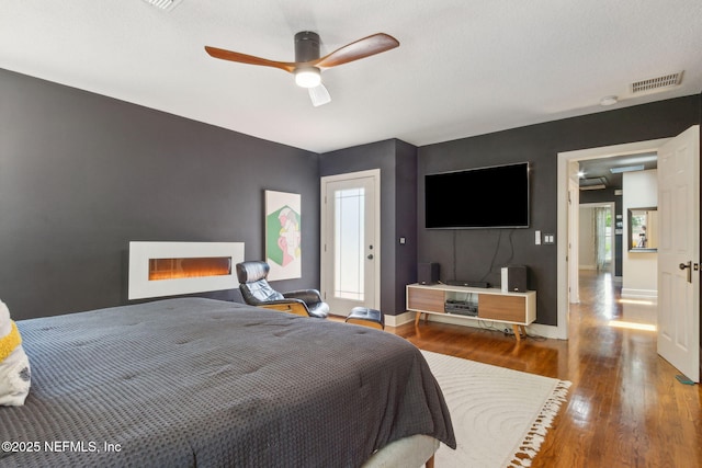 4241 Lexington Ave, Jacksonville, FL 32210 - bedroom featuring wood finished floors, baseboards, and ceiling fan