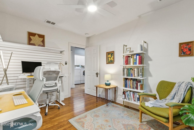 4241 Lexington Ave, Jacksonville, FL 32210 - office area featuring separate washer and dryer, ceiling fan, and wood finished floors