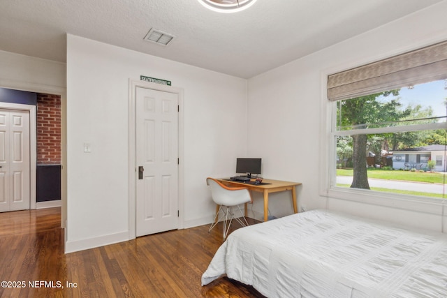 4241 Lexington Ave, Jacksonville, FL 32210 - bedroom featuring wood finished floors and baseboards
