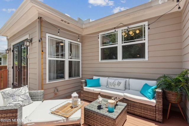 4241 Lexington Ave, Jacksonville, FL 32210 - wooden deck featuring an outdoor living space