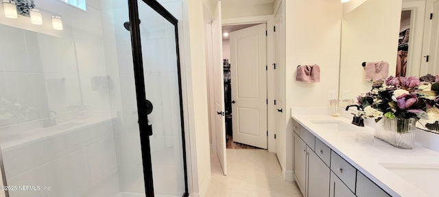 55 Fairlake Cir, Saint Augustine, FL 32092 - full bathroom featuring a spacious closet, double vanity, and a stall shower