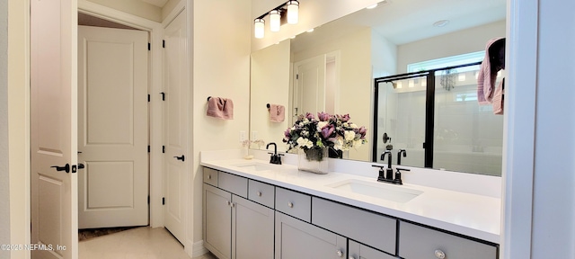 55 Fairlake Cir, Saint Augustine, FL 32092 - bathroom with double vanity and a shower stall