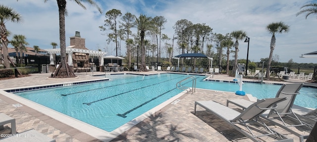 55 Fairlake Cir, Saint Augustine, FL 32092 - community pool featuring a patio area
