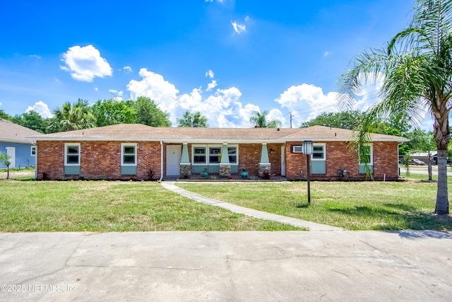 2155 Diana Dr, Palatka, FL 32177 - single story home with brick siding and a front lawn