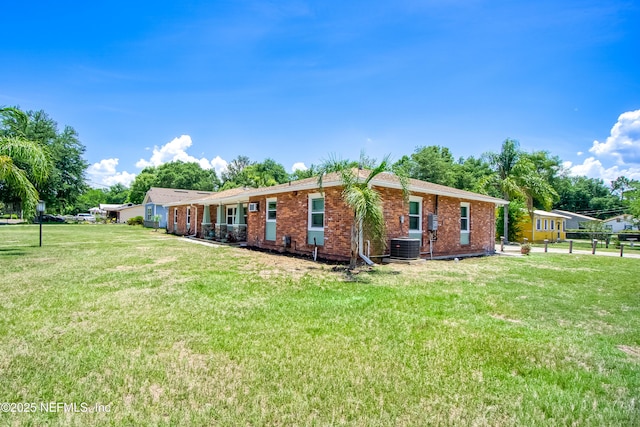 2155 Diana Dr, Palatka, FL 32177 - rear view of house with brick siding