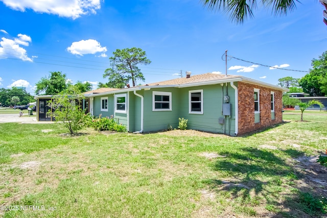 2155 Diana Dr, Palatka, FL 32177 - back of house with a yard