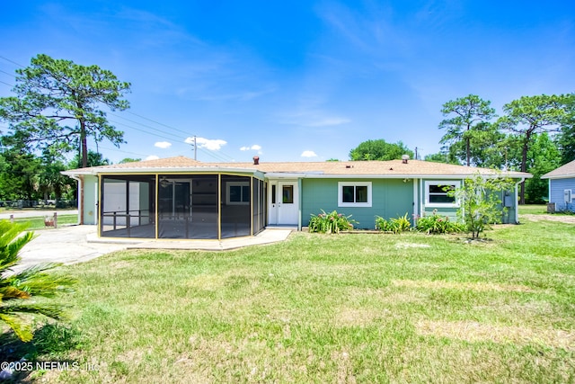 2155 Diana Dr, Palatka, FL 32177 - back of property featuring a sunroom and a yard