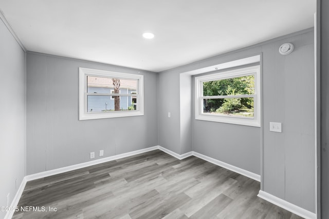 2155 Diana Dr, Palatka, FL 32177 - unfurnished room featuring healthy amount of natural light, wood finished floors, and baseboards