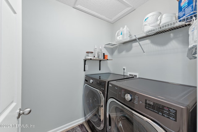 8609 Victoria Falls Dr, Jacksonville, FL 32244 - laundry area featuring washing machine and dryer, attic access, and baseboards