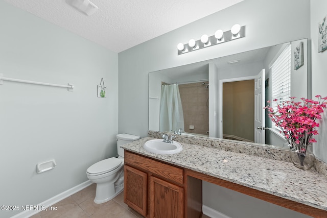 8609 Victoria Falls Dr, Jacksonville, FL 32244 - full bathroom featuring toilet, tile patterned floors, vanity, a shower with curtain, and baseboards