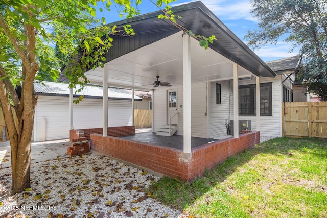 3918 Springfield Blvd, Jacksonville, FL 32206 - rear view of property featuring a ceiling fan and entry steps