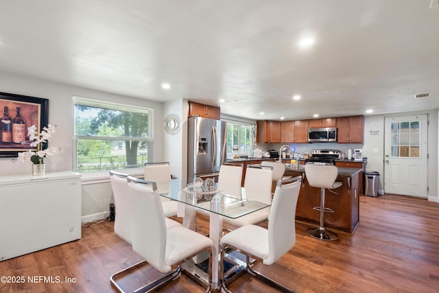 2780 Paul Ave, Jacksonville, FL 32207 - dining room with light wood-style floors, recessed lighting, and baseboards