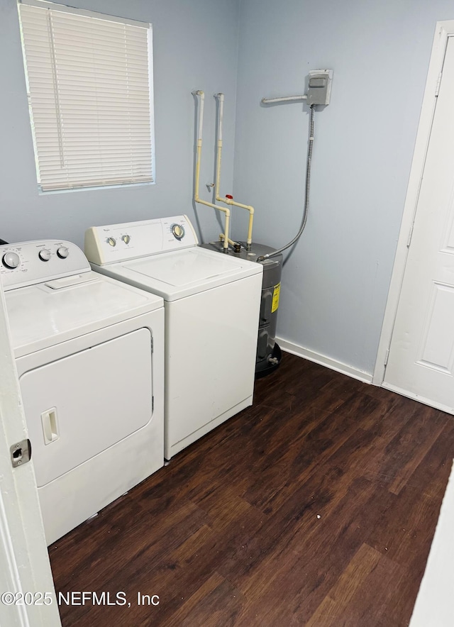 1556 Logan St, Jacksonville, FL 32209 - laundry area featuring washer and dryer, dark wood finished floors, water heater, and baseboards