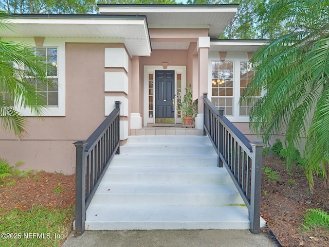 96092 Piney Island Dr, Fernandina Beach, FL 32034 - entrance to property featuring stucco siding