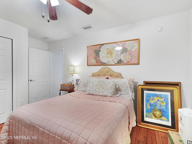 96092 Piney Island Dr, Fernandina Beach, FL 32034 - bedroom with wood finished floors and ceiling fan