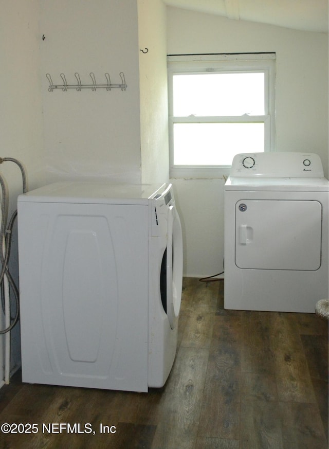 5466 Leonard St, Fernandina Beach, FL 32034 - washroom featuring washing machine and clothes dryer and dark wood-type flooring