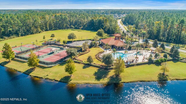 356 Heron Landing Rd, Saint Johns, FL 32259 - aerial view of a heavily wooded area, a pool area, and a large body of water
