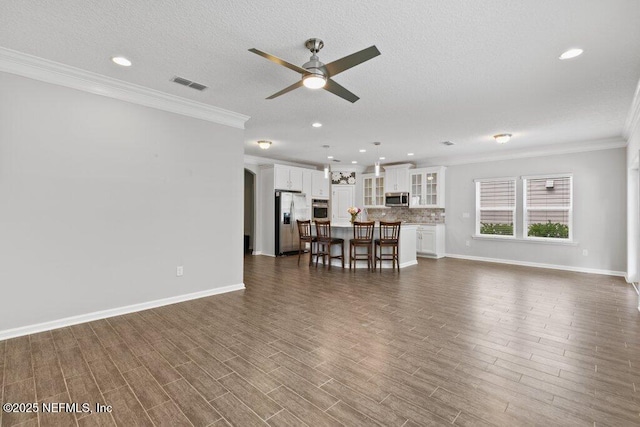 356 Heron Landing Rd, Saint Johns, FL 32259 - living area featuring ceiling fan, crown molding, recessed lighting, dark wood-type flooring, and baseboards
