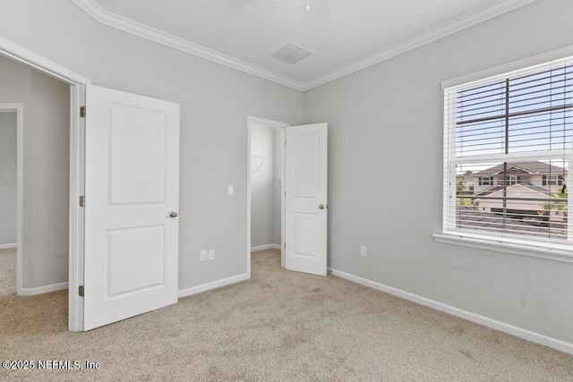 356 Heron Landing Rd, Saint Johns, FL 32259 - unfurnished bedroom featuring carpet, crown molding, and baseboards