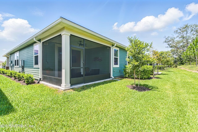 109 Fly Line Dr, Saint Johns, FL 32259 - rear view of property with a sunroom, a lawn, and ceiling fan