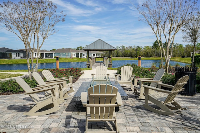 109 Fly Line Dr, Saint Johns, FL 32259 - view of patio featuring a gazebo, an outdoor fire pit, a water view, and a residential view