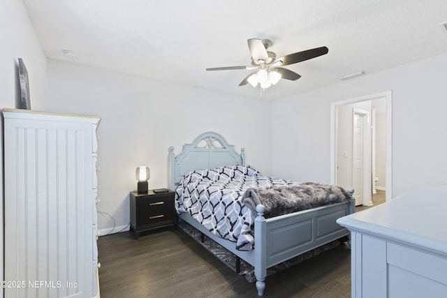 836 Cove St, Green Cove Springs, FL 32043 - bedroom with dark wood-style flooring, ceiling fan, and baseboards