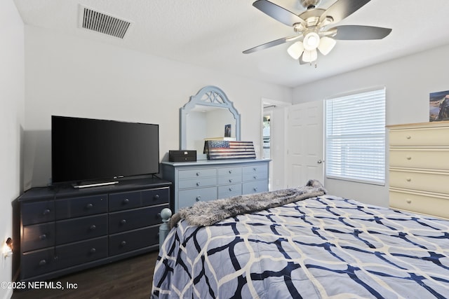 836 Cove St, Green Cove Springs, FL 32043 - bedroom featuring dark wood-type flooring and a ceiling fan