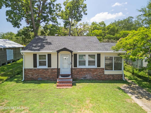 606 Meteor St, Jacksonville, FL 32205 - bungalow-style house with entry steps, brick siding, and a shingled roof
