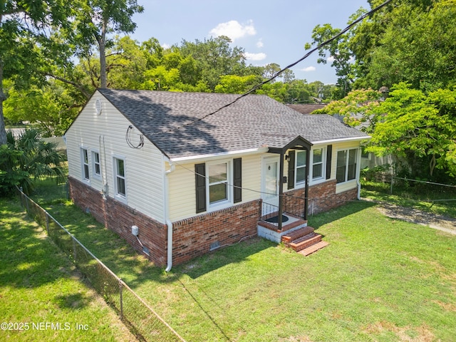606 Meteor St, Jacksonville, FL 32205 - bungalow featuring roof with shingles, brick siding, and crawl space