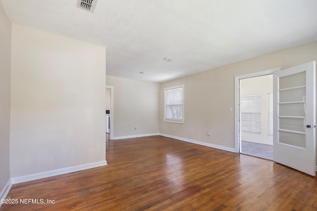 606 Meteor St, Jacksonville, FL 32205 - unfurnished room featuring wood finished floors and baseboards