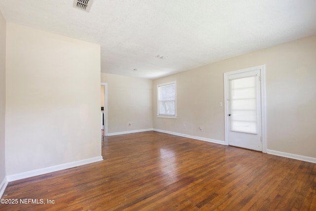 606 Meteor St, Jacksonville, FL 32205 - unfurnished room featuring wood finished floors and baseboards