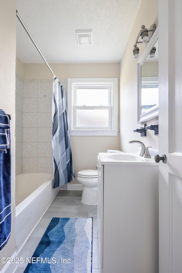 606 Meteor St, Jacksonville, FL 32205 - bathroom featuring vanity, toilet, shower / tub combo with curtain, and tile patterned floors