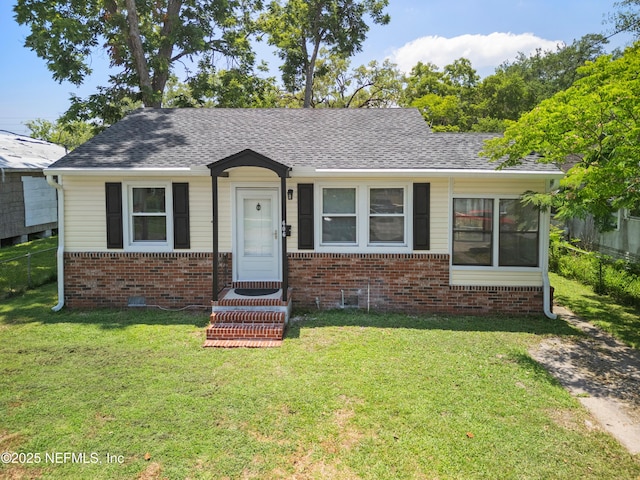 606 Meteor St, Jacksonville, FL 32205 - bungalow-style house featuring entry steps, brick siding, and a shingled roof