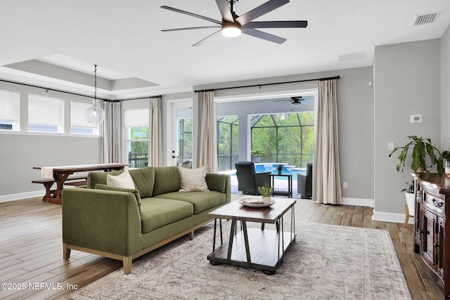 91 Rockhurst Trl, Jacksonville, FL 32081 - living area with ceiling fan, hardwood / wood-style floors, and baseboards