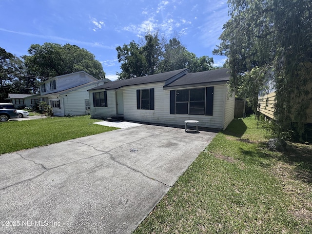 5362 Shen Ave, Jacksonville, FL 32205 - view of front of property featuring concrete driveway and a front lawn