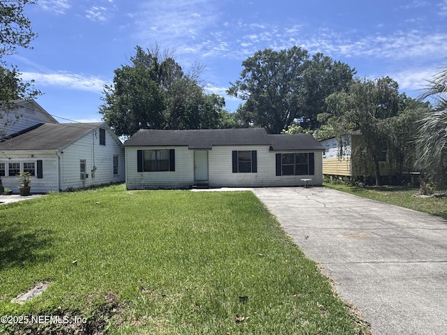 5362 Shen Ave, Jacksonville, FL 32205 - ranch-style house featuring a front yard and concrete driveway