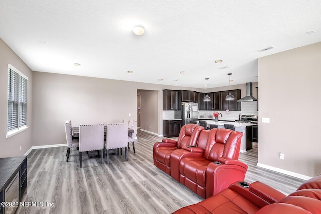 54 Pepperpike Way, Saint Augustine, FL 32092 - living room with light wood-type flooring, baseboards, and recessed lighting