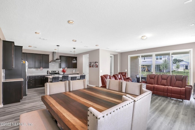 54 Pepperpike Way, Saint Augustine, FL 32092 - dining room featuring light wood-style flooring and recessed lighting