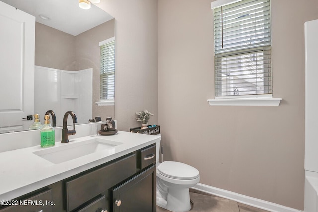 54 Pepperpike Way, Saint Augustine, FL 32092 - bathroom featuring toilet, vanity, a shower, and baseboards