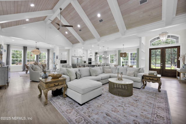 2790 Joe Ashton Rd, Saint Augustine, FL 32092 - living room featuring high vaulted ceiling, light wood-style floors, french doors, recessed lighting, and wood ceiling with exposed beams