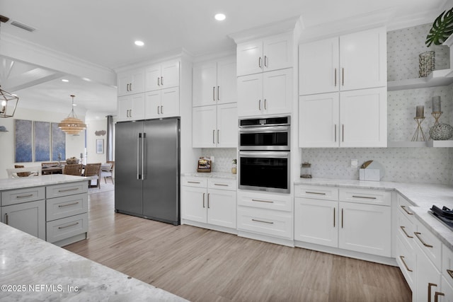 2790 Joe Ashton Rd, Saint Augustine, FL 32092 - kitchen featuring appliances with stainless steel finishes, light wood-style flooring, recessed lighting, white cabinets, and backsplash