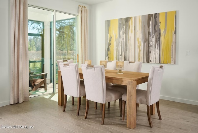 19 Sandy Ln, Palm Coast, FL 32164 - dining room with wood finished floors and baseboards