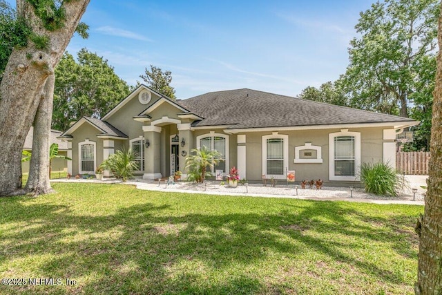 2918 Grande Oaks Way, Fleming Island, FL 32003 - single story home with stucco siding and a shingled roof