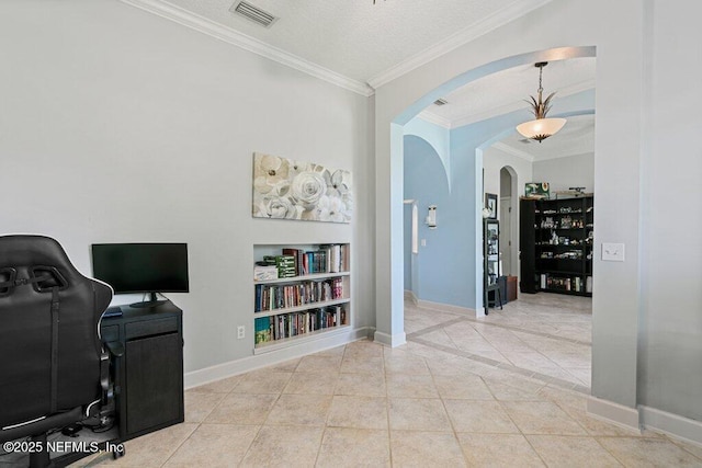 2918 Grande Oaks Way, Fleming Island, FL 32003 - tiled office space featuring arched walkways, built in shelves, crown molding, baseboards, and a textured ceiling
