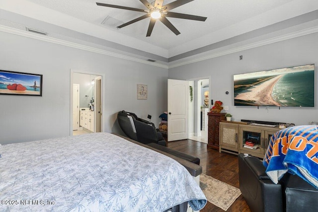 2918 Grande Oaks Way, Fleming Island, FL 32003 - bedroom featuring wood finished floors, a raised ceiling, ceiling fan, crown molding, and ensuite bathroom