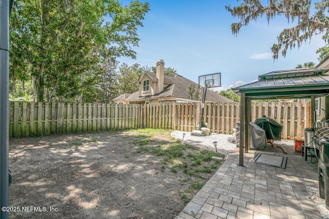 2918 Grande Oaks Way, Fleming Island, FL 32003 - fenced backyard featuring a gazebo and a patio area