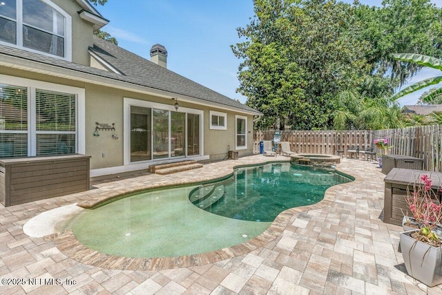 2918 Grande Oaks Way, Fleming Island, FL 32003 - view of pool featuring a patio, a fenced backyard, and a pool with connected hot tub
