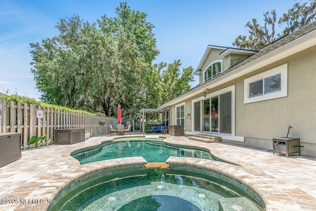 2918 Grande Oaks Way, Fleming Island, FL 32003 - view of swimming pool with a patio and a pool with connected hot tub