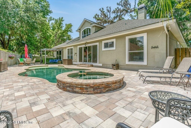2918 Grande Oaks Way, Fleming Island, FL 32003 - view of pool featuring a patio and a pool with connected hot tub
