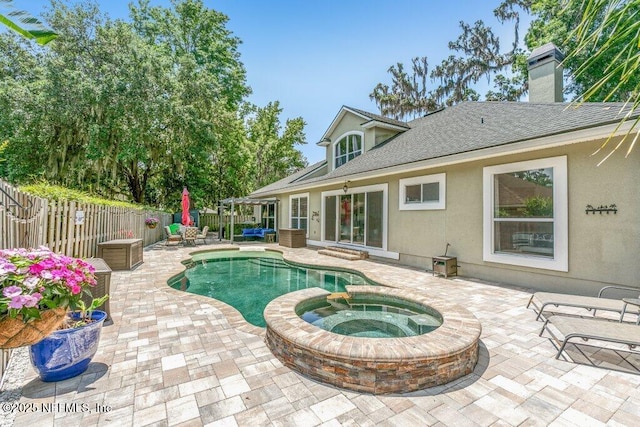 2918 Grande Oaks Way, Fleming Island, FL 32003 - view of pool featuring a patio area and a pool with connected hot tub